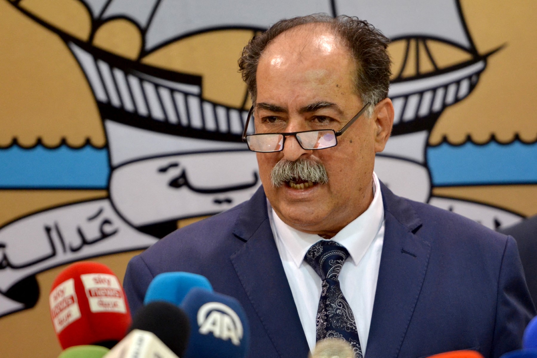 Le ministre tunisien de l'Intérieur limogé, Kamel Feki, lors d’une conférence de presse le 11 mai 2023 à Tunis. (Photo Hasan Mrad AFP)