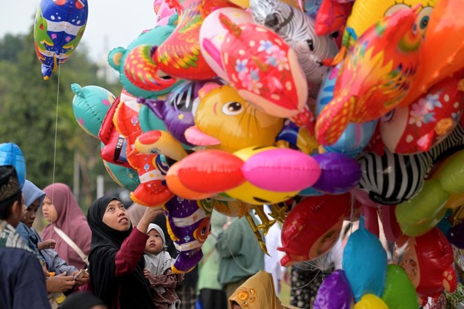 Bien que l’Indonésie compte le plus grand nombre de musulmans au monde, ses traditions pour célébrer l’Aïd al-Adha ont été influencées par d’autres religions. (AFP)