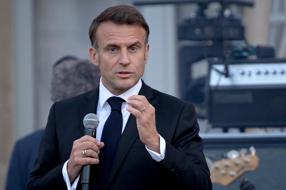 Le président français Emmanuel Macron s'exprime lors de la fête de la musique dans la cour du palais présidentiel de l'Élysée à Paris, le 21 juin 2024. Le 21 juin marque le début annuel de la "Fête de la musique", une tradition marquant le premier jour de l'été, au cours de laquelle la musique est encouragée à être jouée en plein air (Photo Bertrand Guay AFP).