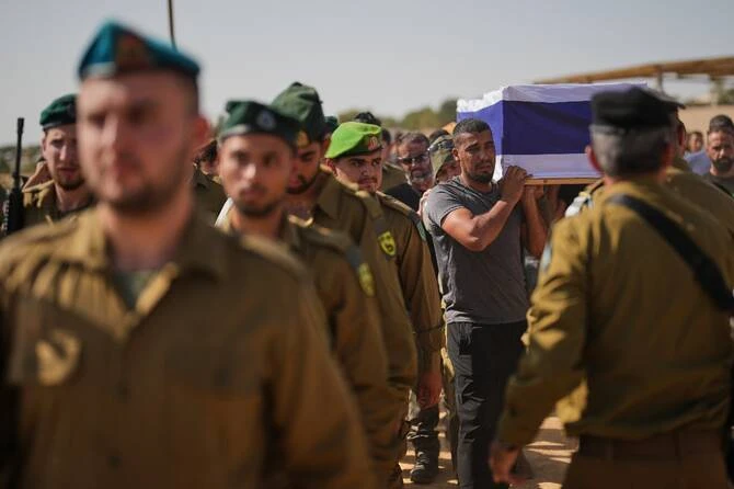 Gaza: le Hamas restitue une dépouille, s'engage à rendre à Israël tous les corps d'otages