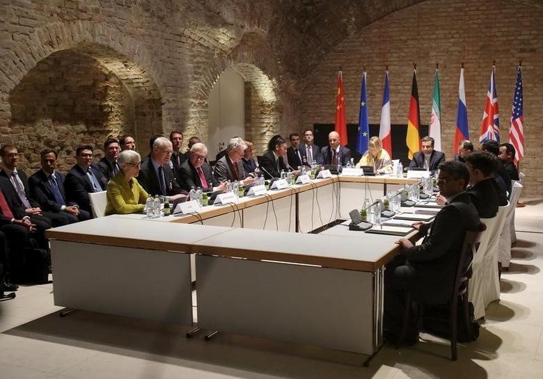 Negotiators of Iran and six world powers face each other at a table in the historic basement of Palais Coburg hotel in Vienna, April 24, 2015. (Reuters)