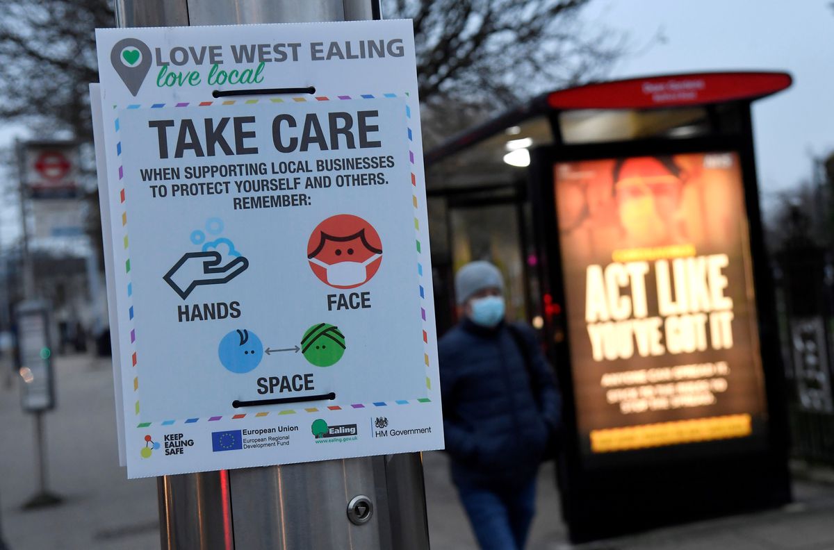 A public health information message is seen on a footpath in West Ealing amid the spread of COVID-19, London, Britain, February 1, 2021. (Reuters)