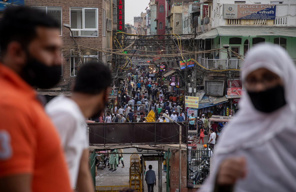 A crowded marketplace, amidst the spread of COVID-19, in the old quarter of Delhi, India, April 14, 2021. (Reuters)