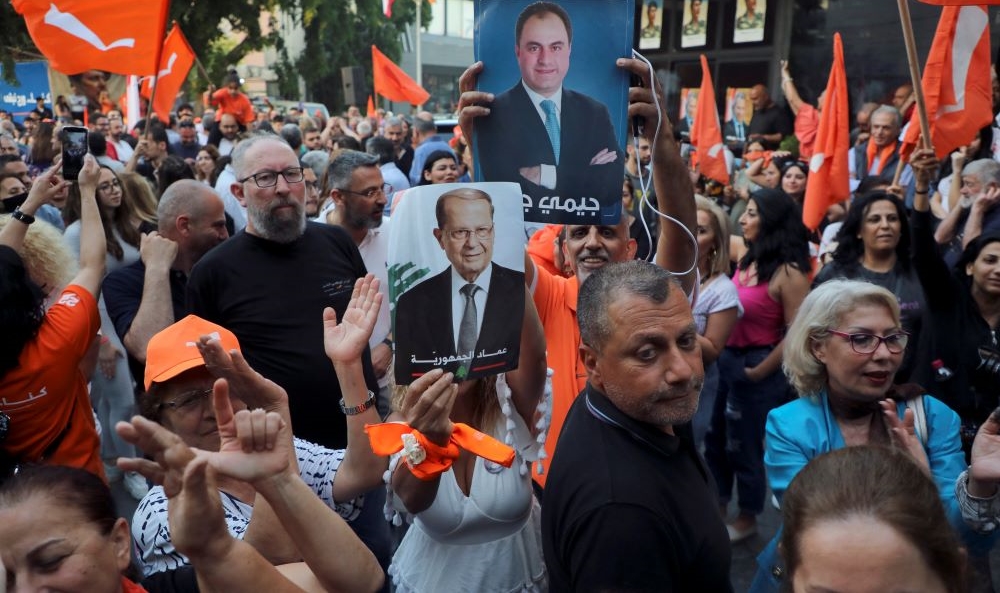 Supporters of Lebanon’s Free Patriotic Movement outside the party’s office in Sin El Fil, Lebanon, May 17, 2022. (Reuters)