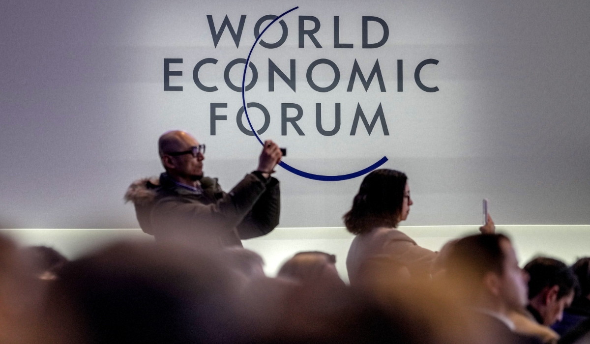 People take pictures on the last day of the forum's Annual Meeting in Davos, Switzerland, Friday, Jan. 19, 2024. (AP)