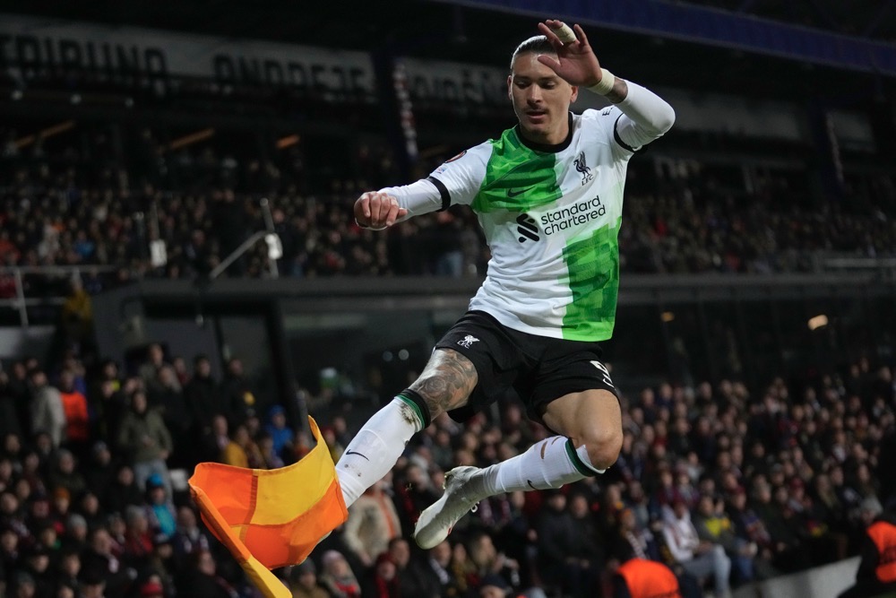 Liverpool's Darwin Nunez kicks the corner flag as he celebrates after scoring his side's third goal during the Europa League round of 16 first leg between Sparta Praha and Liverpool at the Epet Arena in Prague, Czech Republic, Thursday. (AP)