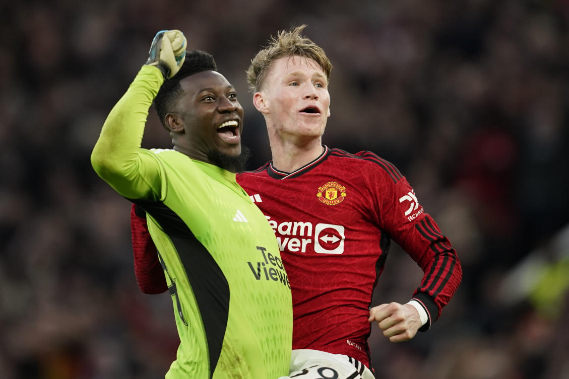 Manchester United’s Scott McTominay, right, celebrates with Manchester United’s goalkeeper Andre Onana at full time of the FA Cup quarterfinal soccer match. (AP)