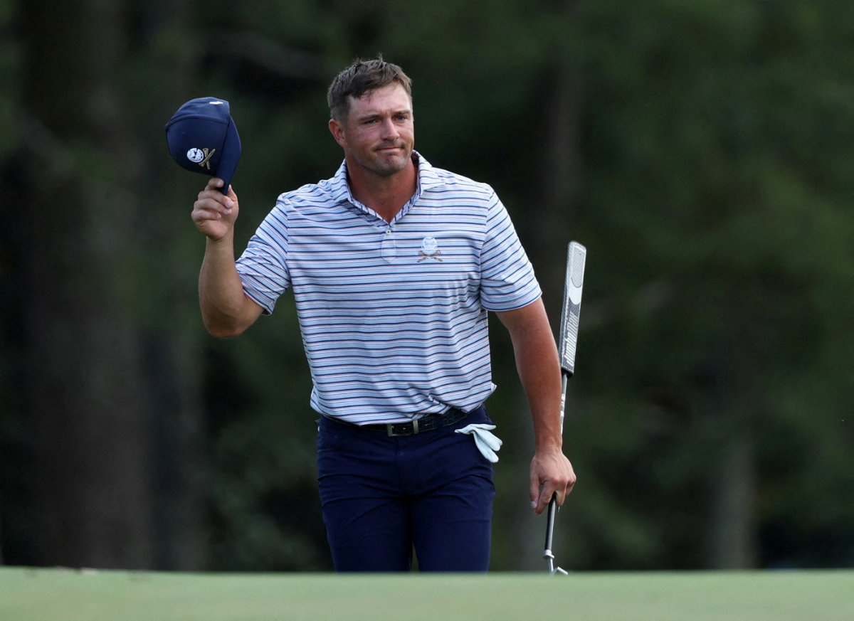 Bryson DeChambeau of the US on the 18th hole during the first round of the Masters golf tournament at Augusta National Golf Club in Agusta, Georgia, on April 11, 2024. (Reuters)