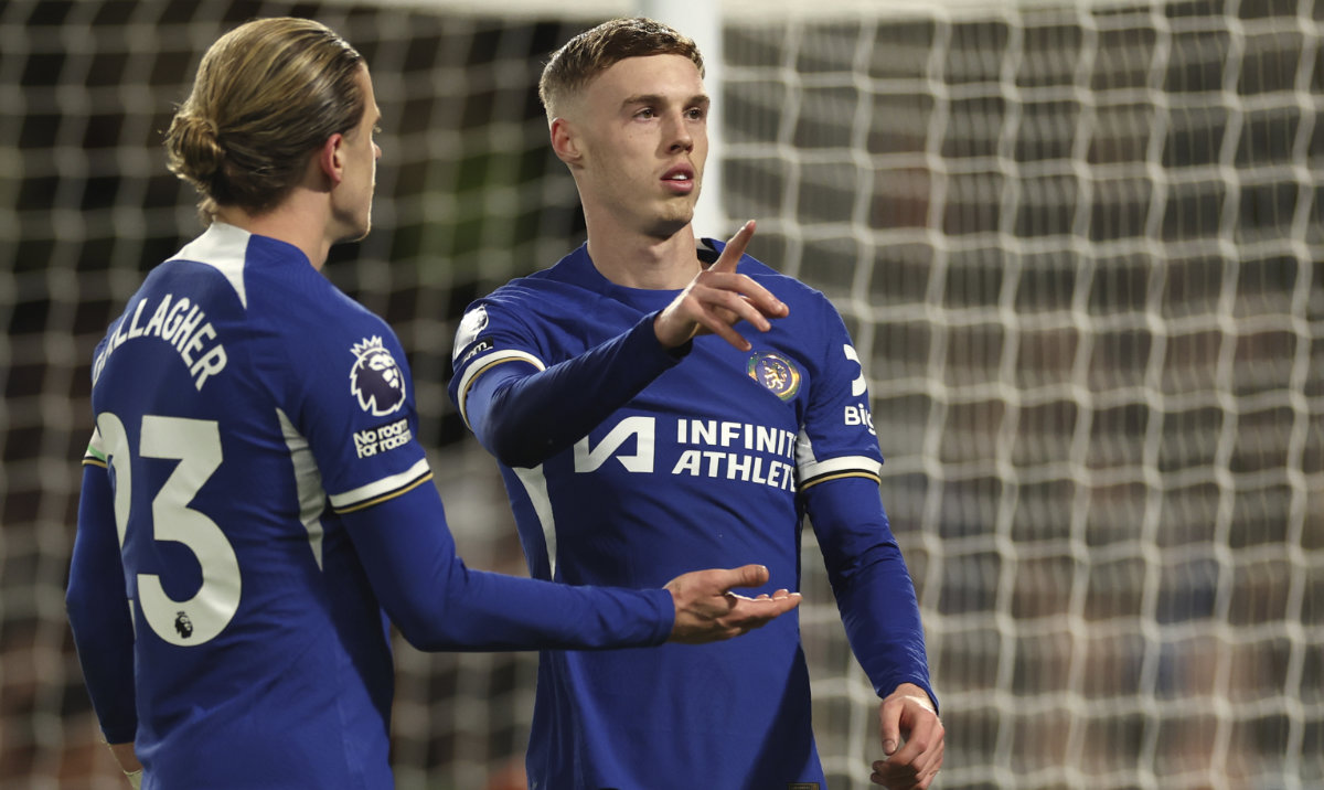 Chelsea's Conor Gallagher, left, and Chelsea's Cole Palmer during the English Premier League soccer match between Chelsea and Everton at Stamford Bridge stadium in London, Monday, April 15, 2024. (AP)
