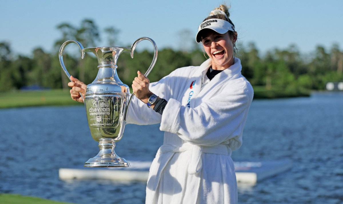 Nelly Korda of the US celebrates with the trophy after winning The Chevron Championship at The Club at Carlton Woods on April 21, 2024 in The Woodlands, Texas. (AFP)