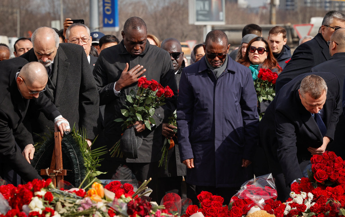 Diplomats attend a flower-laying ceremony in Moscow for victims of last week's concert hall attack. (REUTERS)