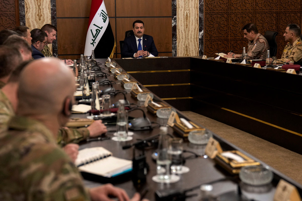 Iraqi PM Mohamed Shia al-Sudani meeting with Iraqi and US-led coalition military officials in Baghdad on Jan. 27, 2024. (AFP)