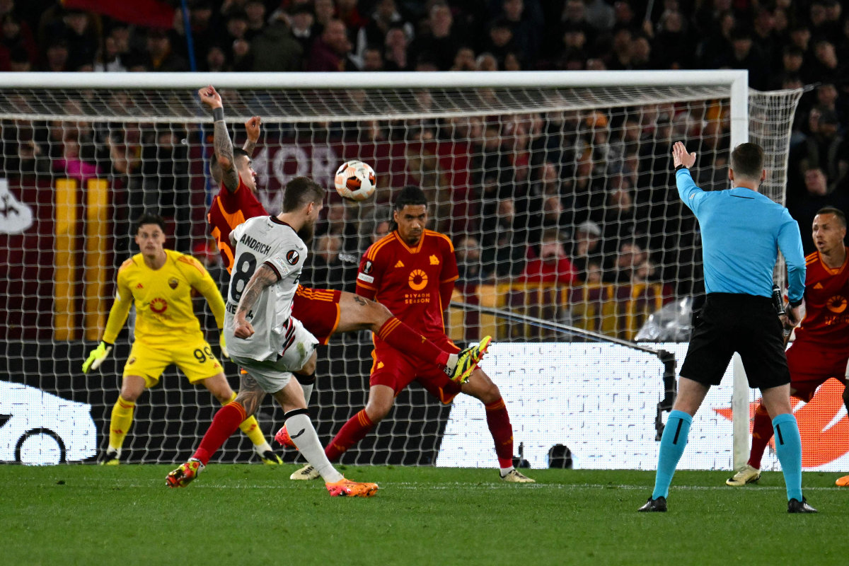 Bayer Leverkusen's German midfielder #08 Robert Andrich scores his team's second goal during the UEFA Europa League semi final first leg match between AS Roma and Bayer Leverkusen at the Olympic stadium on May 2, 2024 in Rome. (AFP)