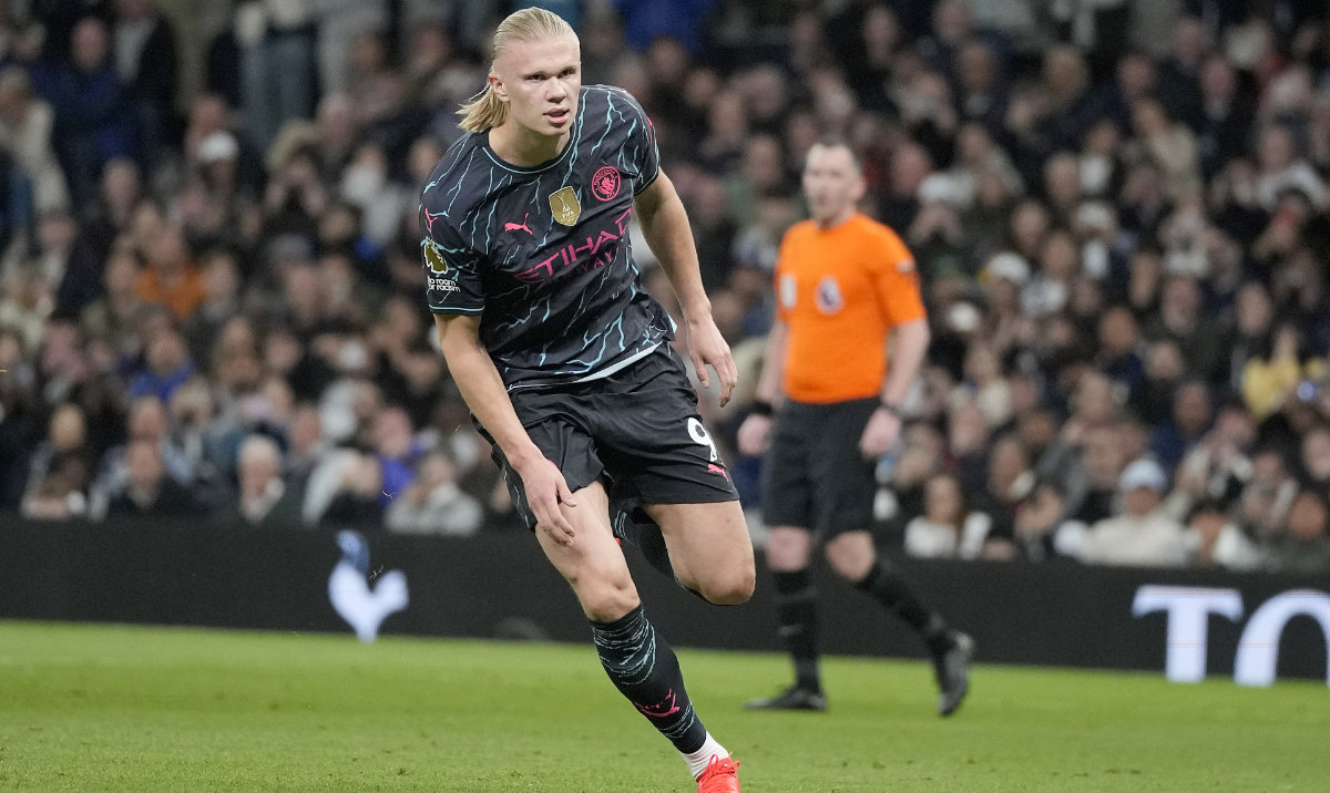 Manchester City's Erling Haaland celebrates scoring his side's second goal during the English Premier League soccer match between Tottenham Hotspur and Manchester City at Tottenham Hotspur Stadium in London, Tuesday, May 14, 2024. (AP)