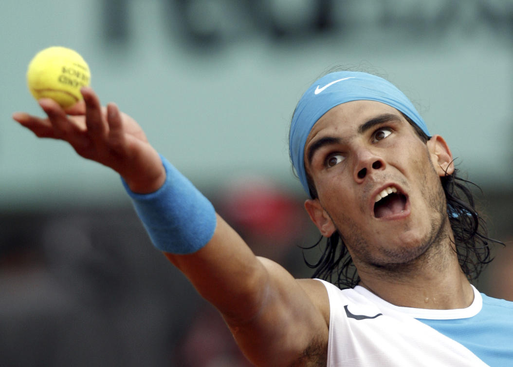 Spain’s Rafael Nadal serves the ball to Switzerland’s Roger Federer during the men’s final match of the French Open tennis tournament at the Roland Garros stadium in Paris in 2007. (AP/File)