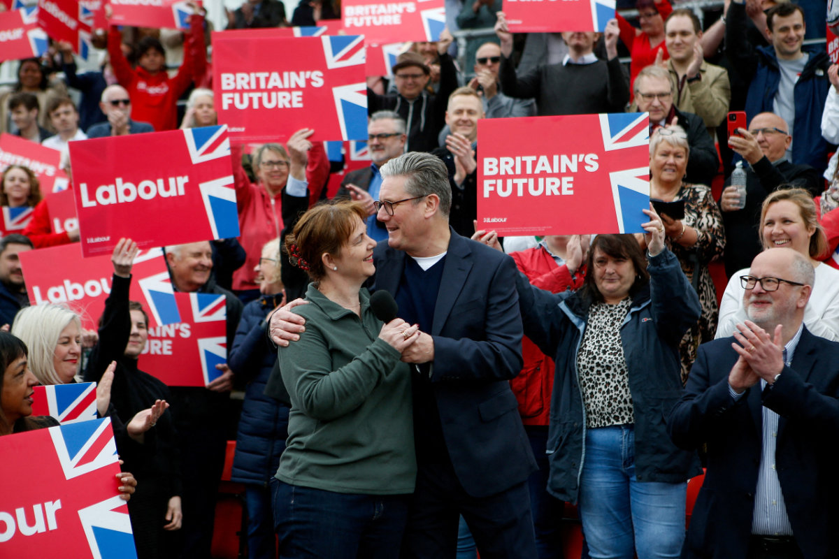 Britain's Labour Party leader Keir Starmer with East Midlands' new mayor, Claire Ward, on May 4, 2024. (REUTERS)