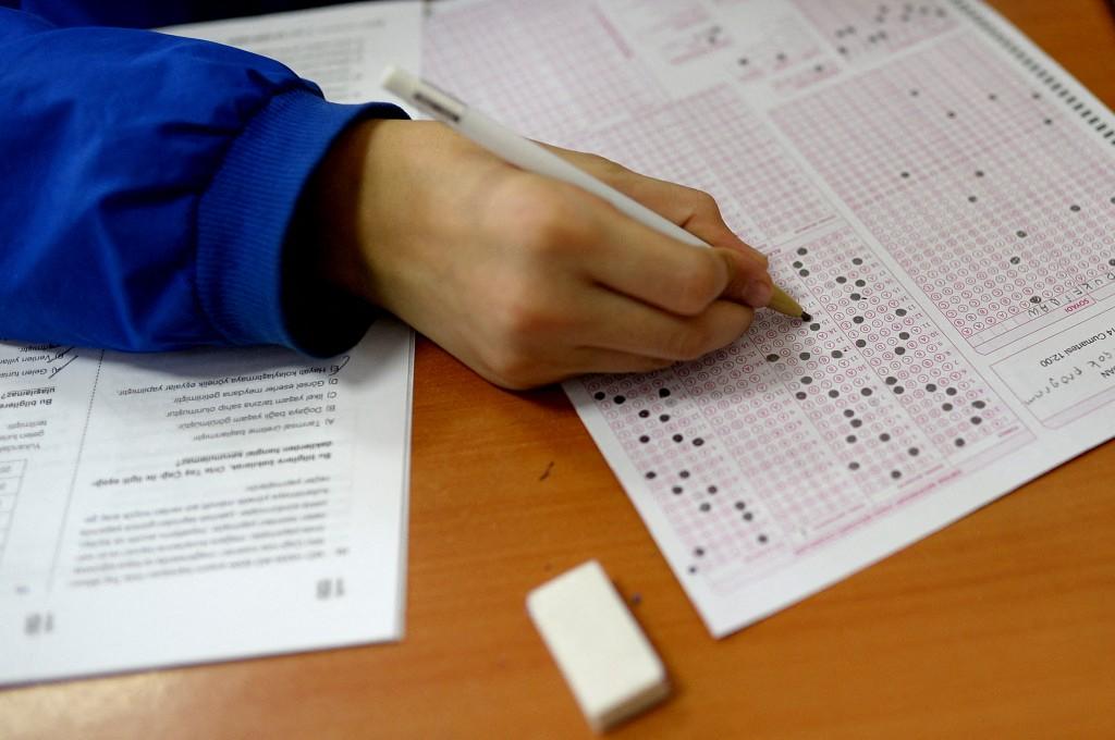 A student takes an exam on January 4, 2014 at the Firat Education Center in Istanbul. (AFP)