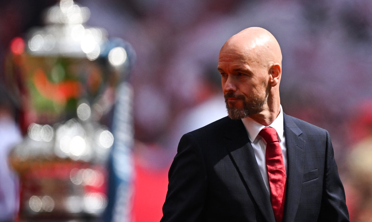 Manchester United's Dutch manager Erik ten Hag reacts as he walks past the FA Cup Trophy prior to the English FA Cup final football match between Manchester City and Manchester United at Wembley stadium, in London, on May 25, 2024. (AFP)