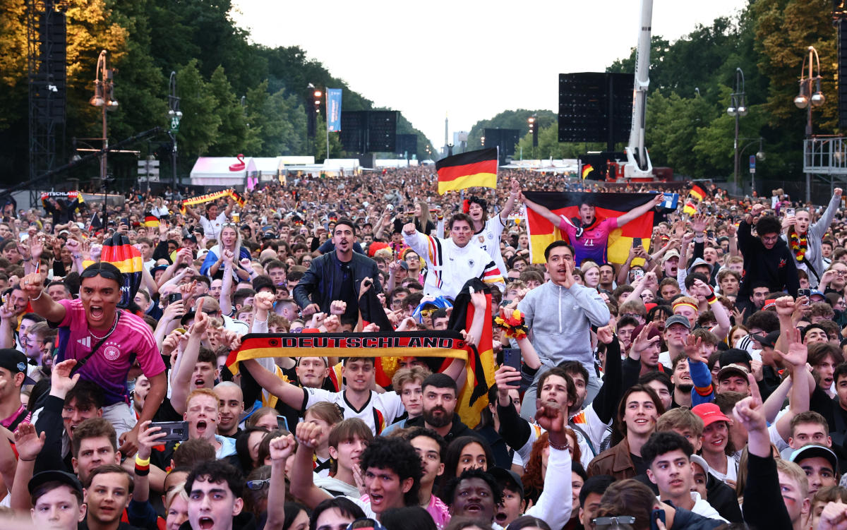 Germany fans display scarves and flags in the fan park ahead of the Euro 2024 match between Germany and Scotland at Brandenburg Gate, Berlin, on Jun. 14, 2024. (Reuters)