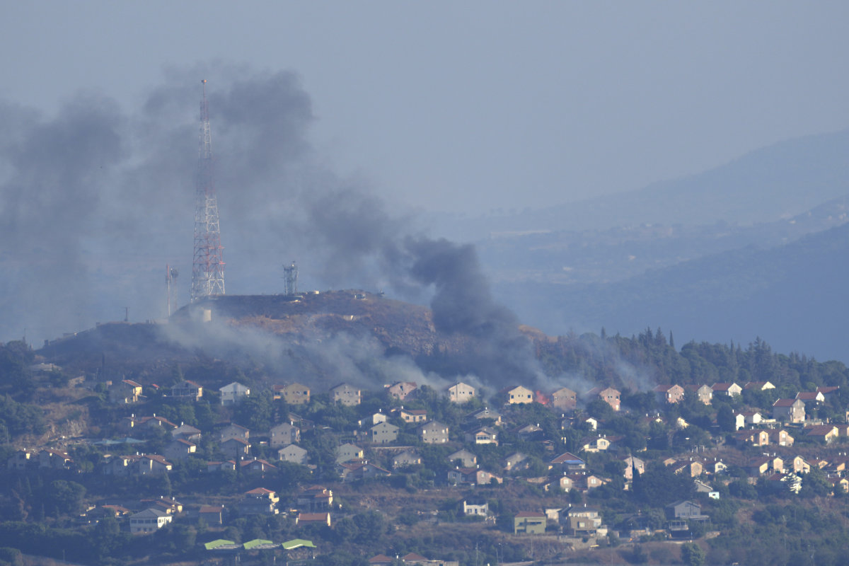 Smoke rises from the northern Israeli border town of Metula after it was hit by Hezbollah shelling on June 22, 2024. (AP)