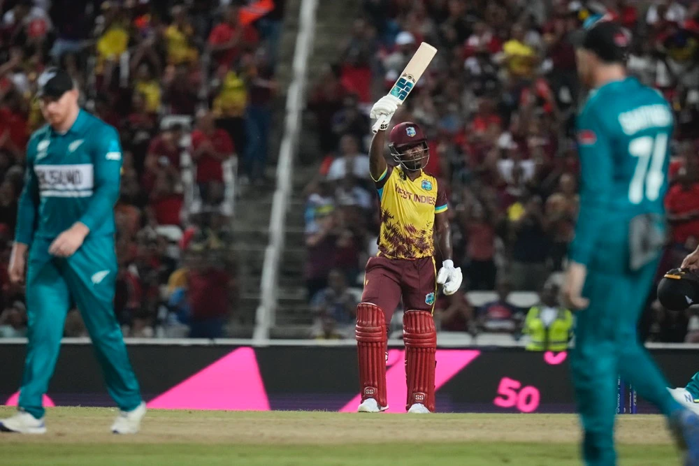 West Indies' Sherfane Rutherford reacts after scoring 50 runs during the men's T20 World Cup cricket match between the West Indies and New Zealand. (AP)