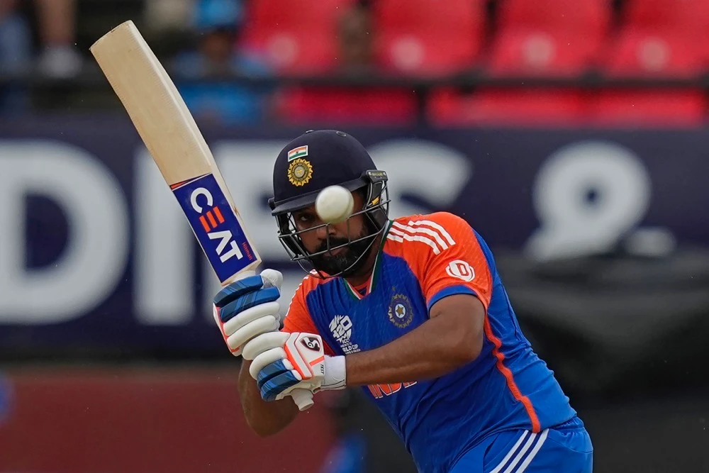 India's captain Rohit Sharma plays a shot during the ICC Men's T20 World Cup second semifinal cricket match between England and India at the Guyana National Stadium in Providence, Guyana. (AP)