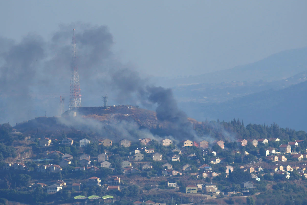 Smoke rises from the northern Israeli border town of Metula after it was hit by Hezbollah shelling on June 22, 2024. (AP)