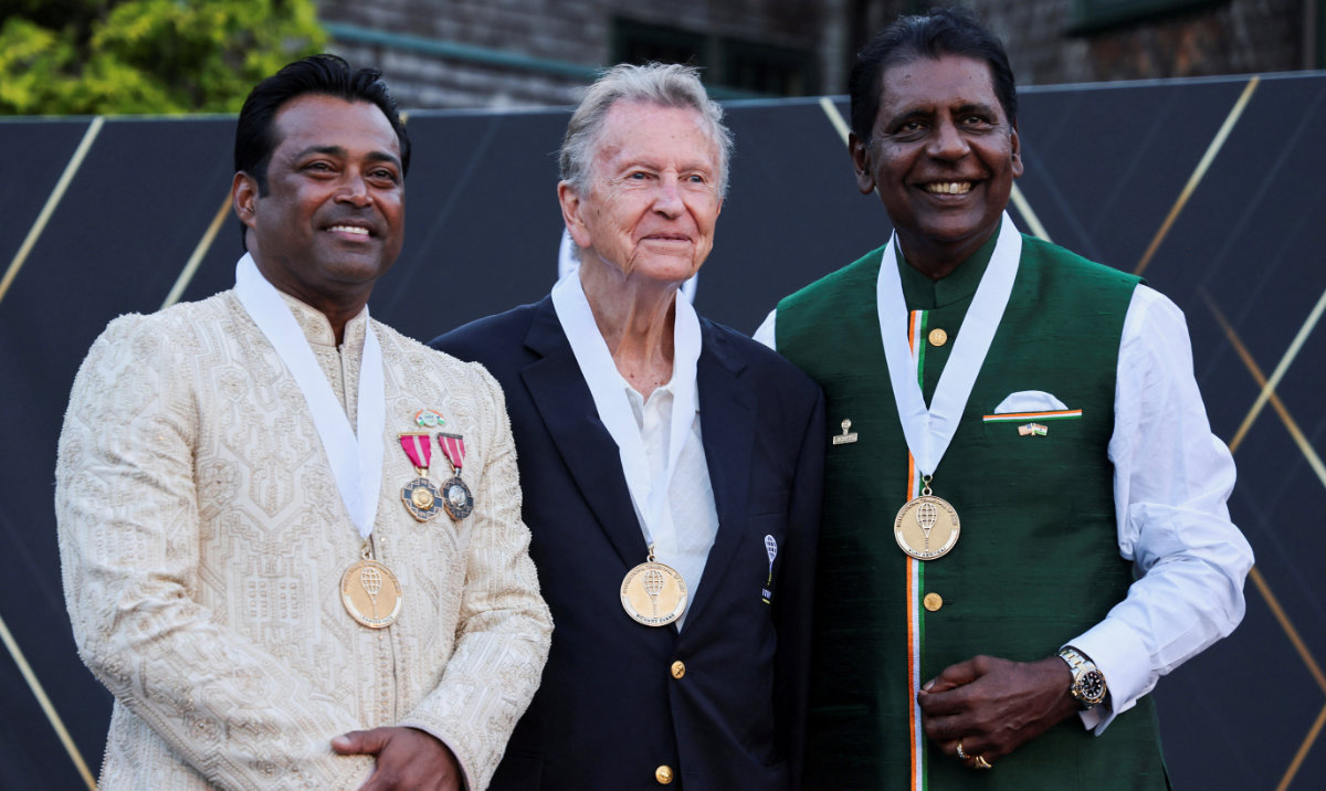 Leander Paes, Richard Evans and Vijay Amritraj pose for a photo after getting inducted into the International Tennis Hall of Fame in Newport, Rhode Island, on July 20, 2024. (Reuters)