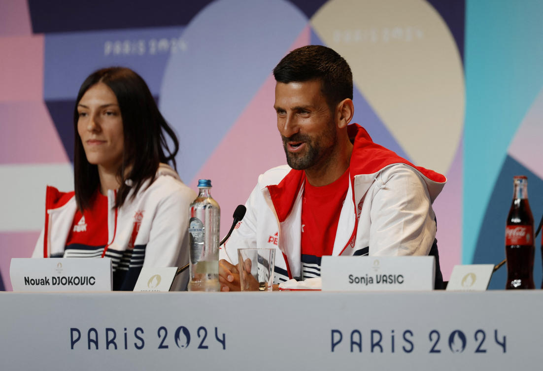 Tijana Boskovic and Novak Djokovic during a team Serbia press conference at the Paris 2024 Olympics Main Press Center, Paris, on Jul. 25, 2024. (Reuters)