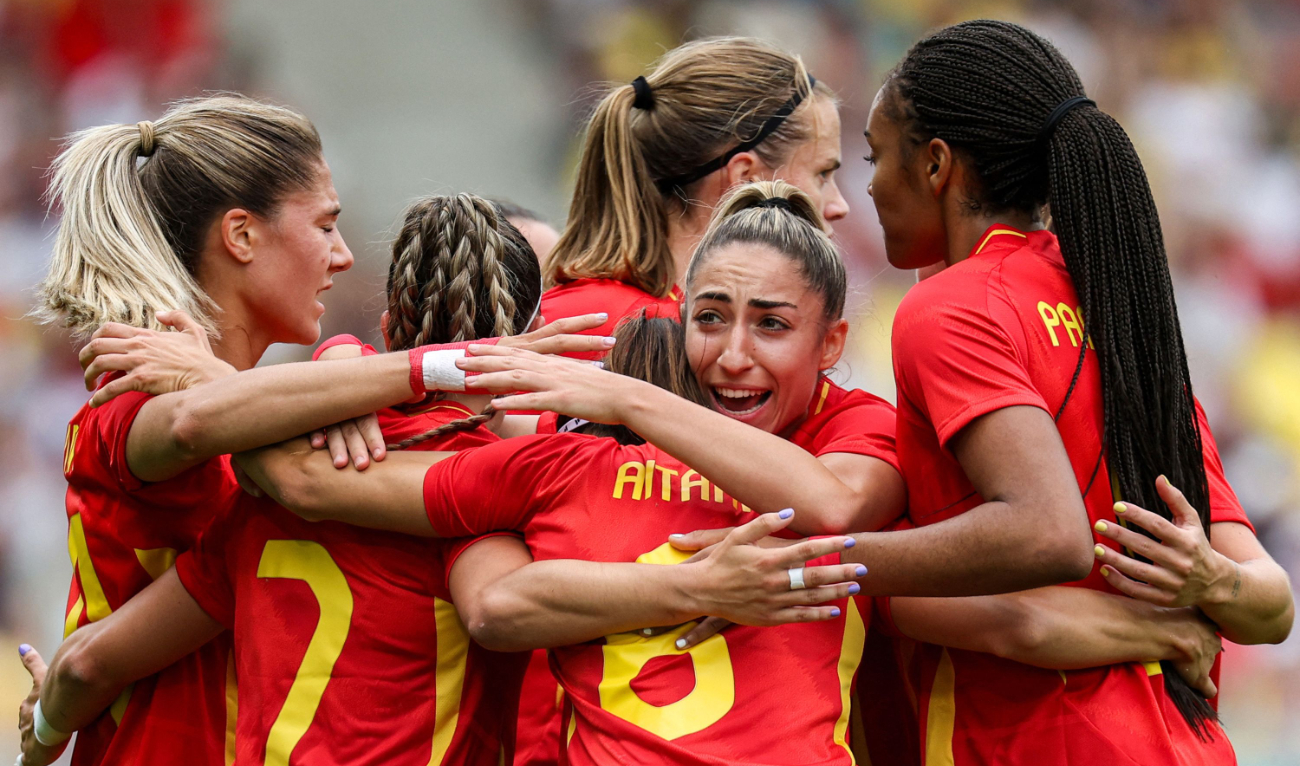 Spain’s #06 Aitana Bonmati celebrates with teammates after scoring her team’s first goal in the women’s group C football match against Japan during the Paris 2024 Olympic Games at La Beaujoire Stadium in Nantes on July 25, 2024. (AFP)