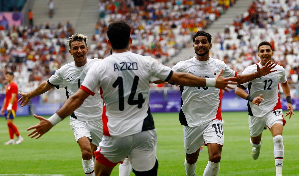 Ibrahim Adel of Egypt celebrates scoring their first goal with teammates Zizo and Ahmed Eid during the Paris 2024 Olympics Men’s Group C match against Spain at Bordeaux Stadium, on Jul. 30, 2024. (Reuters)