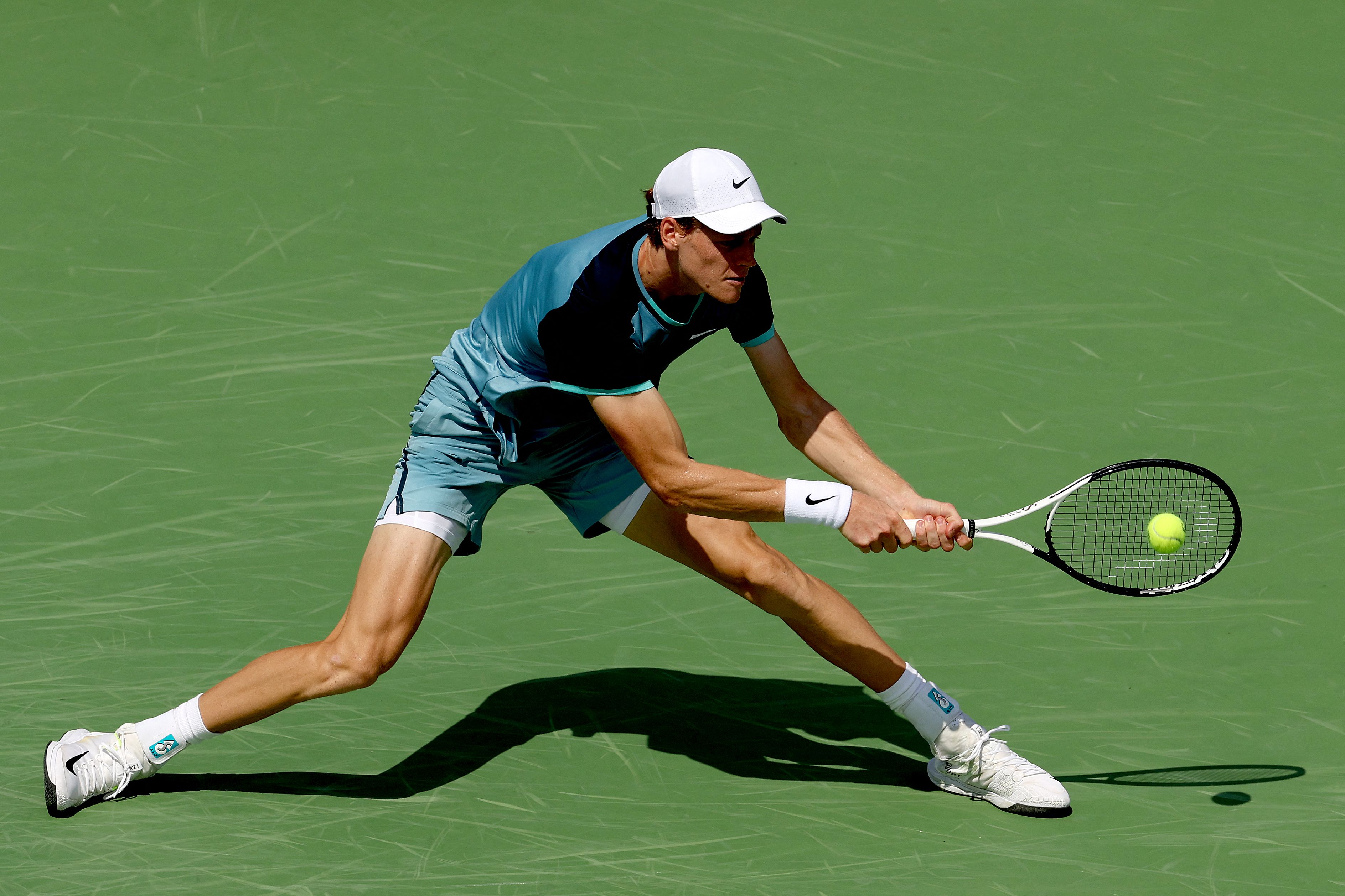 Jannik Sinner of Italy returns a shot to Andrey Rublev of Russia during Day 7 of the Cincinnati Open at the Lindner Family Tennis Center on Saturday in Mason, Ohio. (Getty Images North America / AFP)