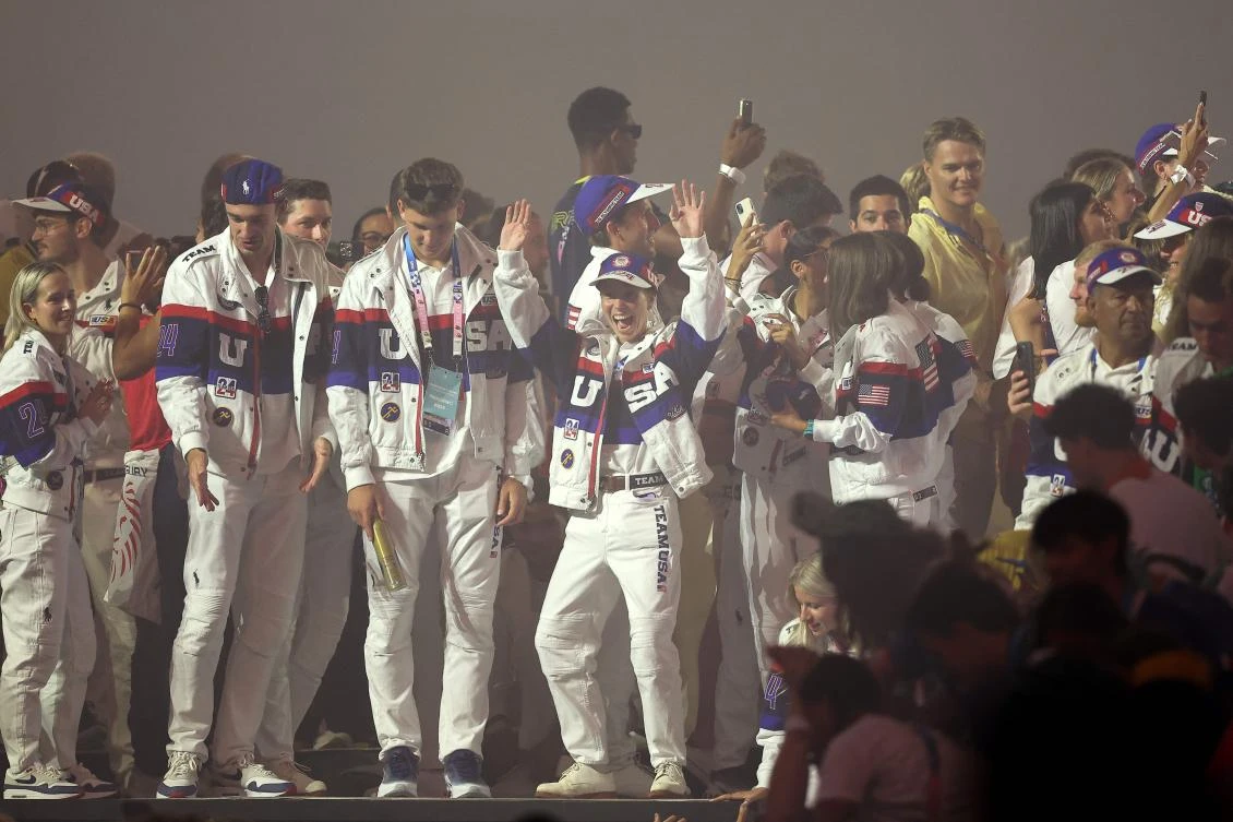 USA team athletes dance during the closing ceremony of the Paris 2024 Olympic Games at the Stade de France, in Saint-Denis, in the outskirts of Paris, on August 11, 2024. (Photo by FRANCK FIFE / AFP)