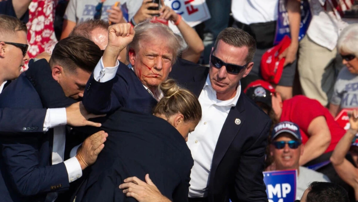 A network of dozens of websites mimicking independent local news sites are floating the false claim that the Democratic Party was behind the assassination attempt against Donald Trump in July. (AFP/File photo)