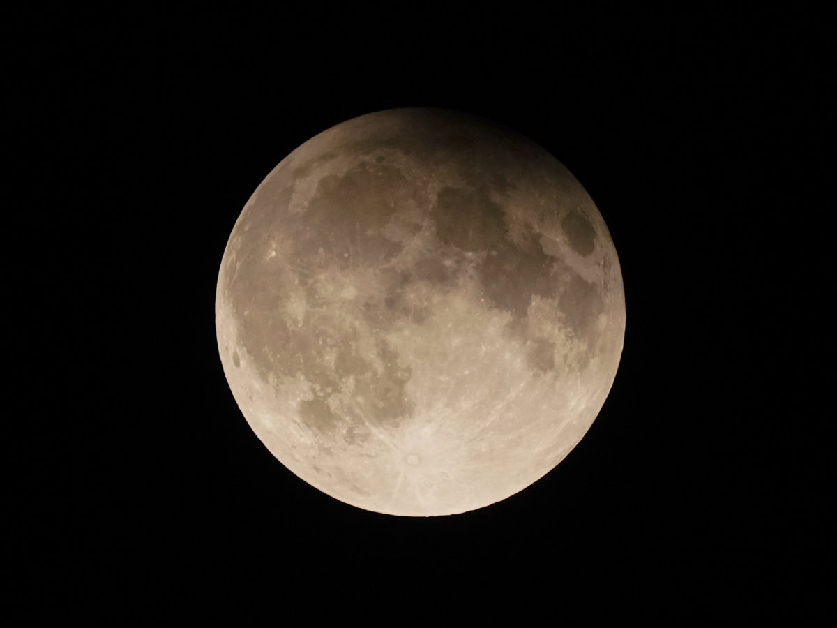 A supermoon with a partial lunar eclipse rises over Lake Michigan in Chicago on Sept. 17, 2024. (AP/File)