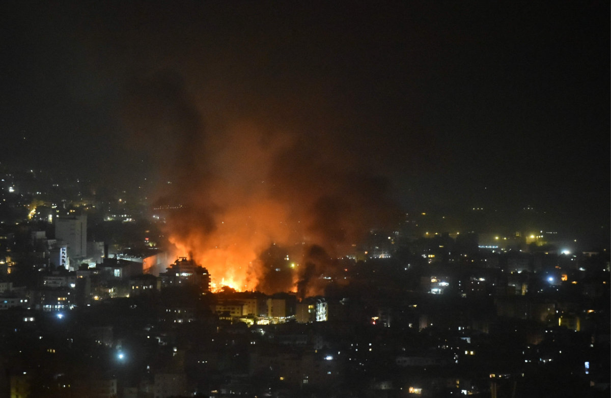 Smoke billows from the site of an Israeli airstrike that targeted a neighborhood in Beirut’s southern suburb early on September 28, 2024. (AFP)