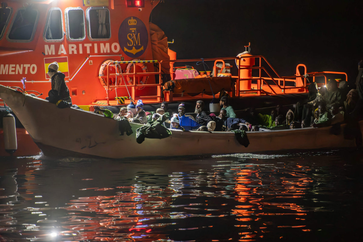 A Spanish rescue vessel escorts a 'cayuco' boat with 74 migrants on the Canary island of El Hierro, on Sept. 17, 2024. (AFP)