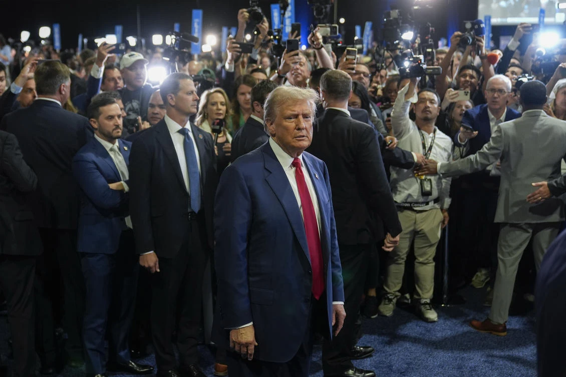 Donald Trump arrives to speak to reporters in the spin room after a presidential debate with Kamala Harris, Philadelphia, Tuesday, Sept. 10, 2024. (AP Photo)