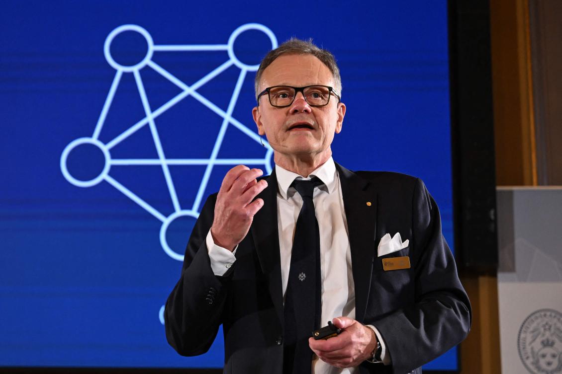 Member of the Nobel Committee for Physics Anders Irbaeck delivers a speech following the announcement of the 2024 Nobel Prize in Physics at the Royal Swedish Academy of Sciences in Stockholm, Sweden on October 8, 2024. (AFP)