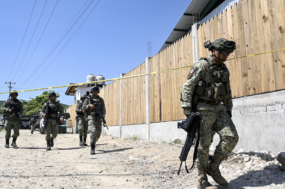 Wracked by violence related to drug trafficking, Mexico is one of the world’s most dangerous countries for journalists, news advocacy groups say. Mexican soldiers patrol after an armed confrontation in Tecpan de Galeana of Guerrero state on Oct. 24, 2024. (AFP file photo)