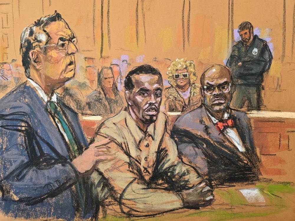 Sean 'Diddy' Combs', accompanied by attorneys Marc Agnifilo and Anthony Ricco, and with his mom seated in the back, attends a hearing in federal court in the Manhattan borough of New York City. (Reuters)