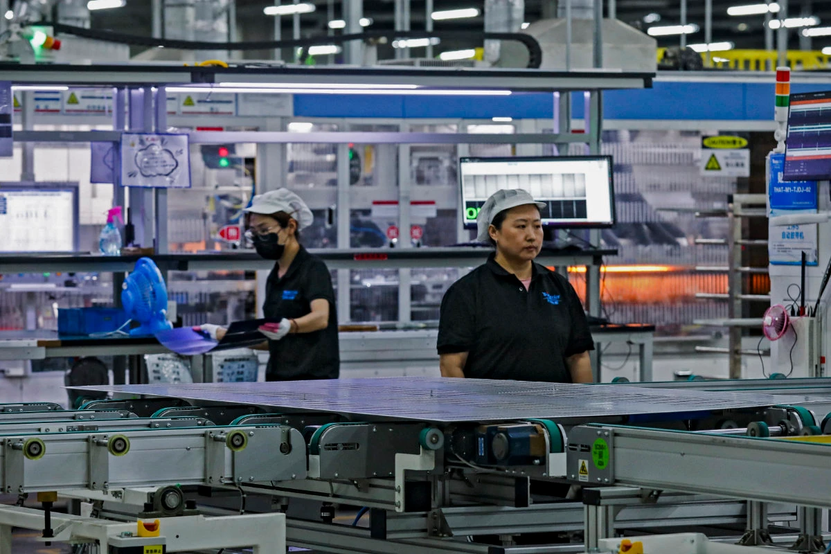 Inside a solar photovoltaic panel factory in Huai'an, in eastern China's Jiangsu province. (AFP)