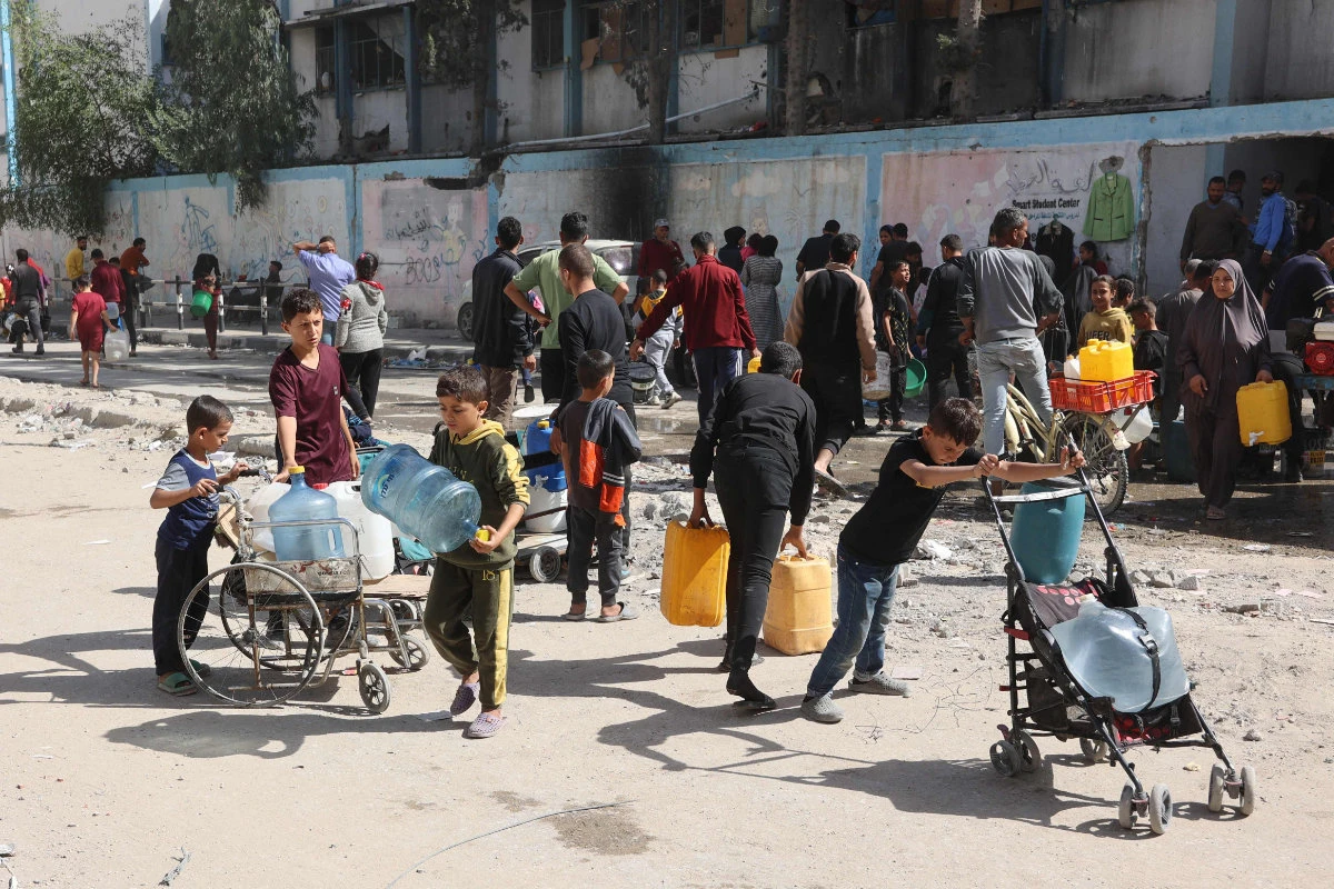 Displaced Palestinians seek shelter at a UN run school in northern Gaza Strip on Oct. 25, 2024. (AFP)