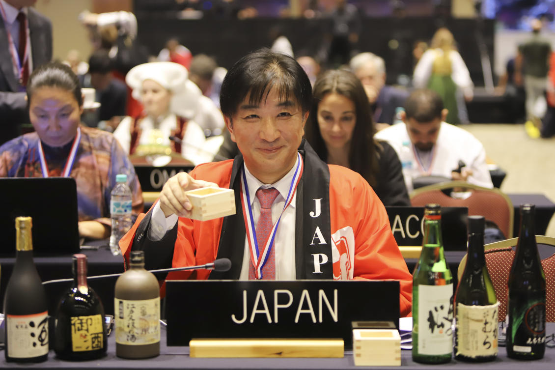 Japan's Takehiro Kano, ambassador to UNESCO, reacts the traditional Japanese brewing of sake was named Intangible Cultural Heritage during a UNESCO World Heritage Convention in Asuncion, Paraguay, Wednesday, Dec. 4, 2024. (AP)