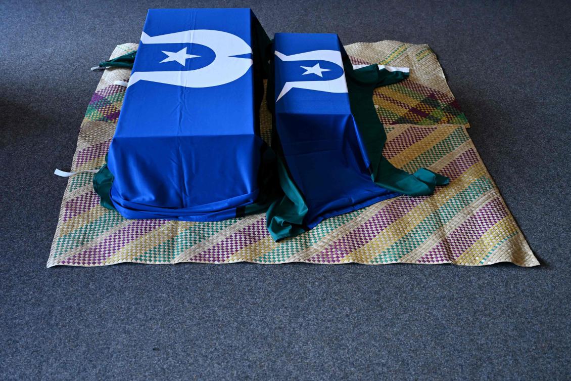 Coffins with ancestral, human remains of the Ugaram Le Omasker, that were part of the Ethnologisches Museum (Ethnological Museum) collection, are pictured during a commemoration ceremony for their restitution to Australia, in Berlin, on Dec. 5, 2024. (AFP)