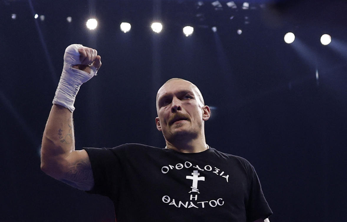 Oleksandr Usyk celebrates his win. (Action Images/Reuters)
