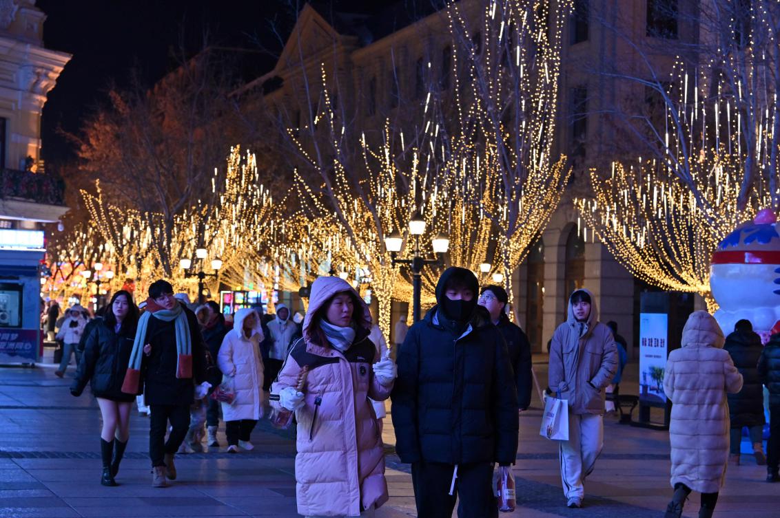 Animal ears and pom-poms on fuzzy hats adorn tourists’ heads on the streets of the frigid northeastern Chinese city of Harbin, which is enjoying a surge in visitors driven by social media. (AFP)