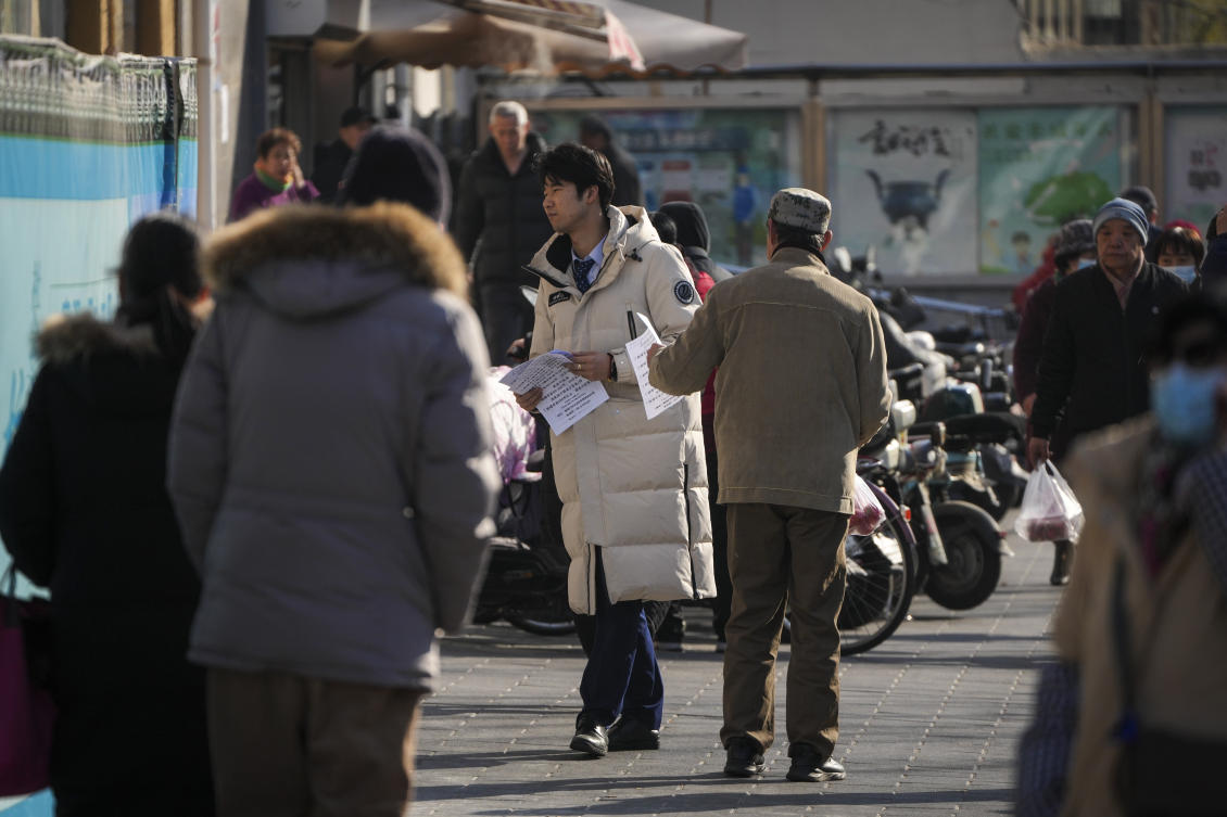 General photo of Chinese residents near a supermarket in Beijing, Wednesday, Feb. 26, 2025. (AP)