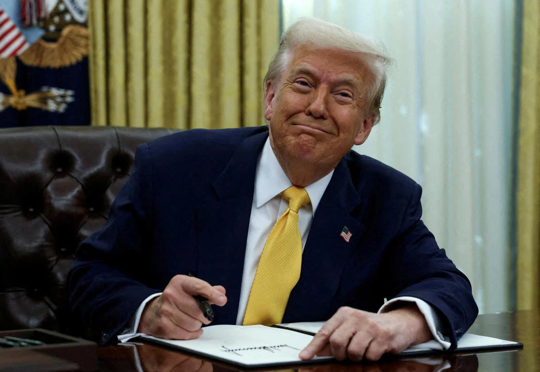 FILE PHOTO: US President Donald Trump signs an executive order in the Oval Office of the White House in Washington, D.C., US, March 7, 2025. (REUTERS)