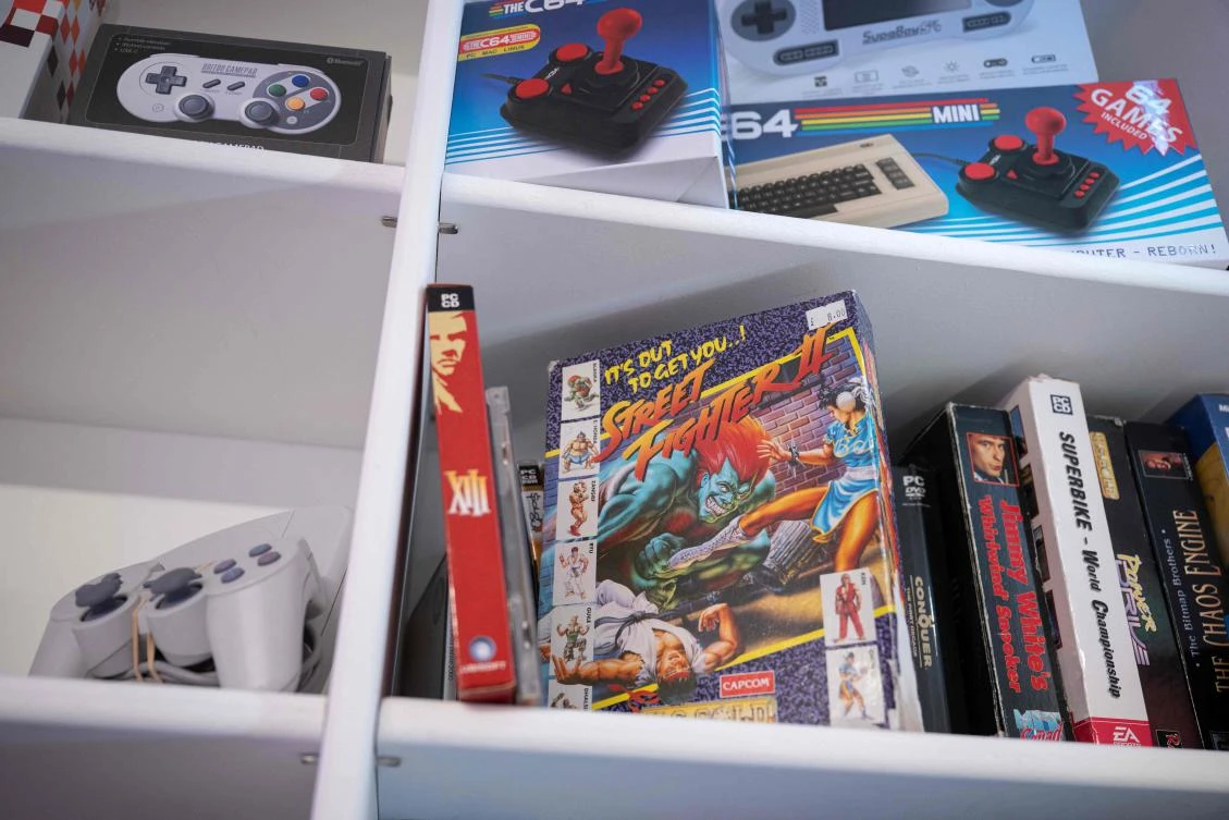 The shelves lining Luke Malpass’s home workshop are a gamer’s treasure trove stretching back decades, with components of vintage Game Boys, Sega Mega Drives and Nintendos jostling for space and awaiting repair. (AFP)